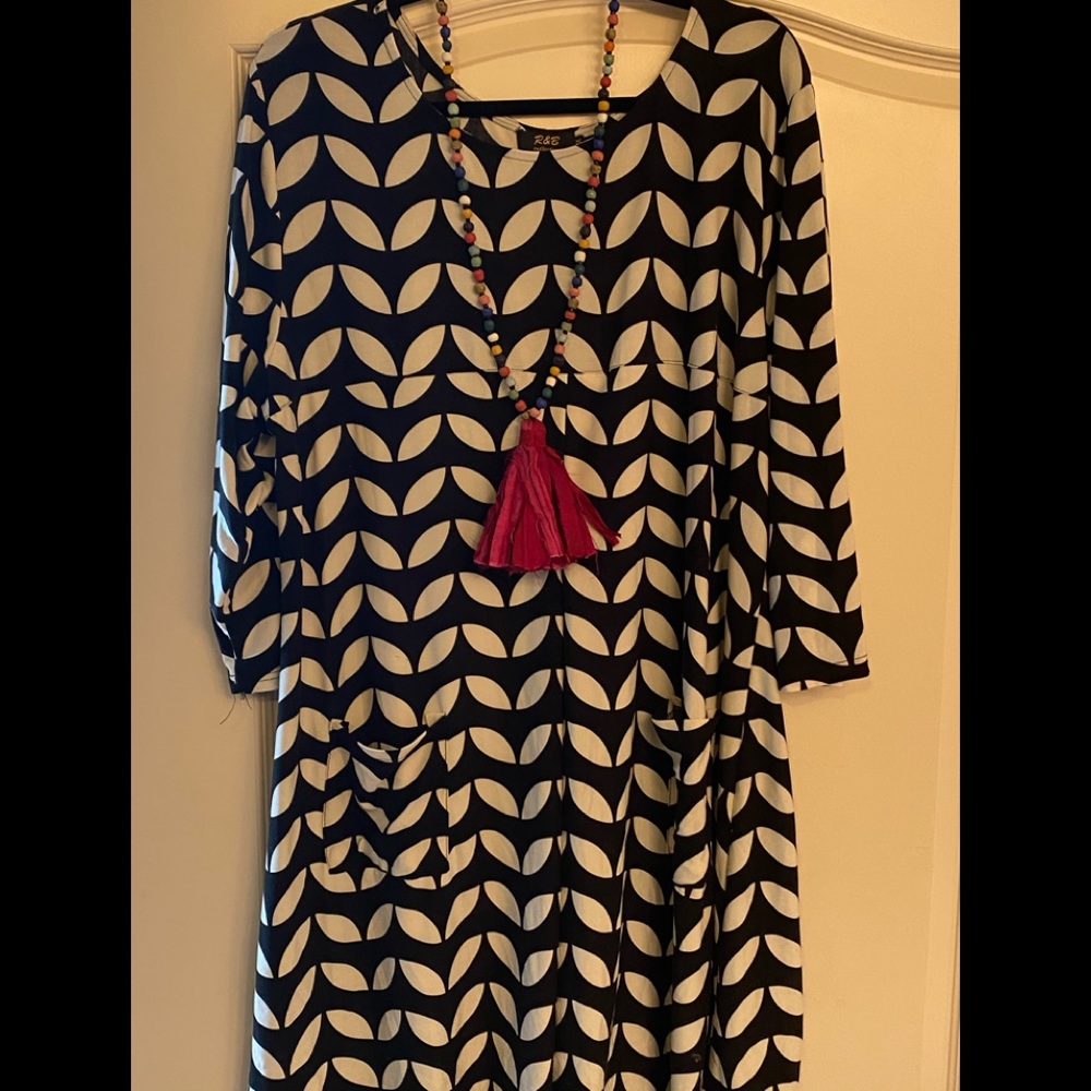 Knit mod tunic with pockets
